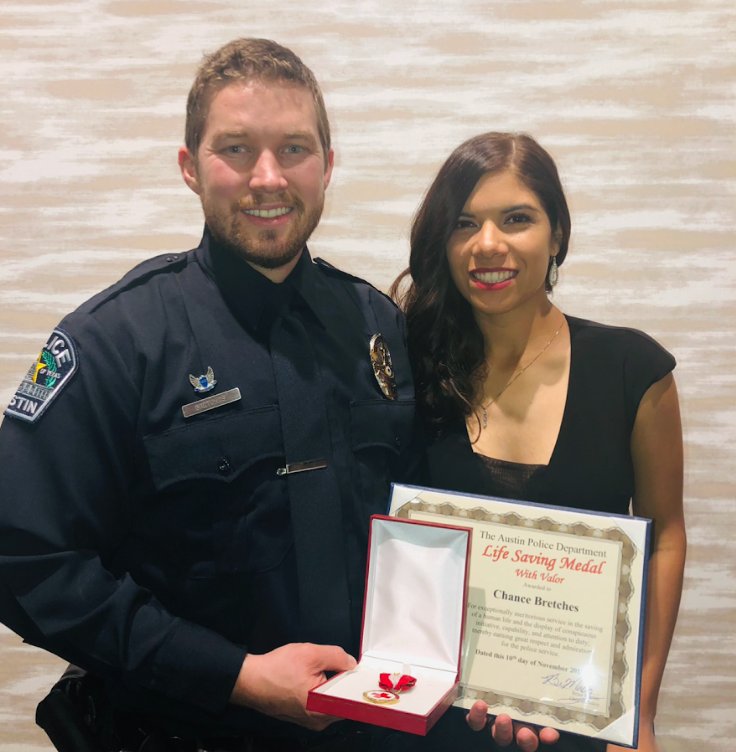Officer Chance Bretches receiving Life Saving Medal